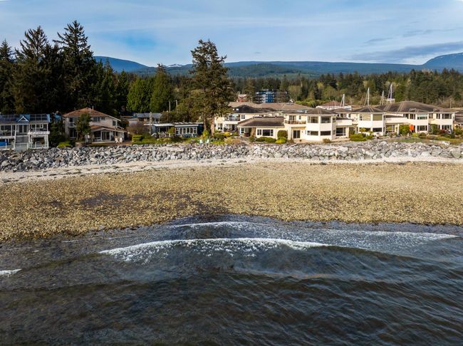 Exterior space with a water and mountain view | Image 39