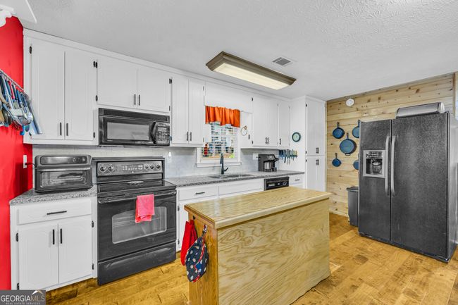 7616 Nicholson Rd, House other with 3 bedrooms, 2 bathrooms and 2 parking in cumming GA | Image 27