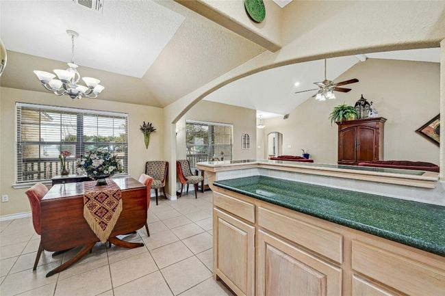 The dining room just off the kitchen makes serving a breeze. | Image 9
