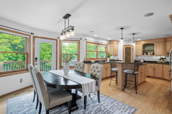 This gorgeous dining room and kitchen are ready for everything from quiet mornings to lively dinner parties. | Image 10