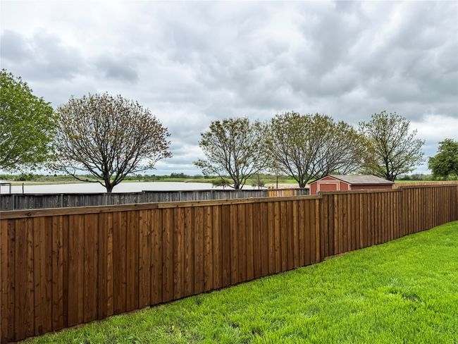 View of yard featuring a fenced backyard | Image 23