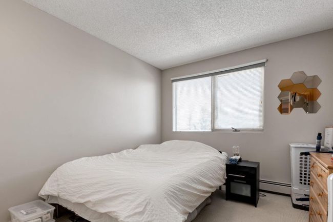 7 - 118 Village Heights Sw, Home with 2 bedrooms, 1 bathrooms and 2 parking in Calgary AB | Image 16