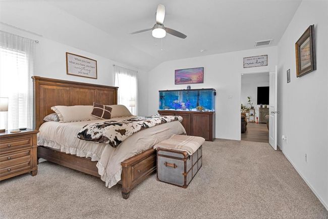 This primary bedroom is tucked in the rear of the home. | Image 18