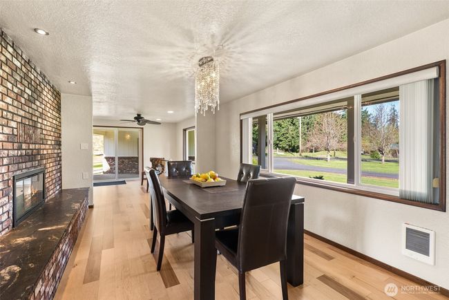 Dining room leading into coffee sitting area or potentially dining area. | Image 8