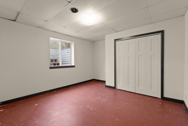 Bedroom in basement | Image 26