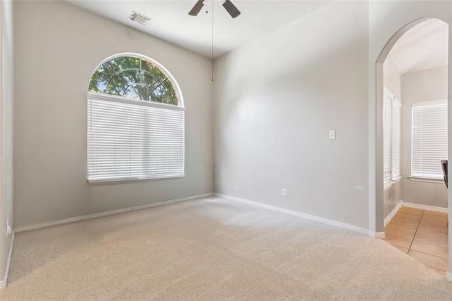 Another view of the front room which can be used as a formal dining or office. | Image 10