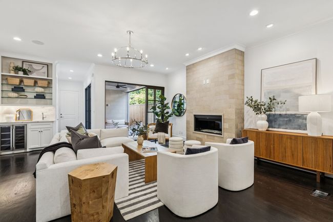 Wet bar in living room perfect for entertaining. | Image 11