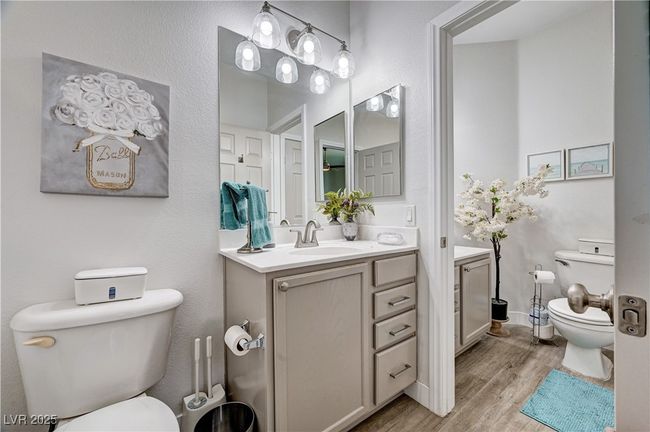 Bathroom featuring wood finished floors and vanity | Image 17