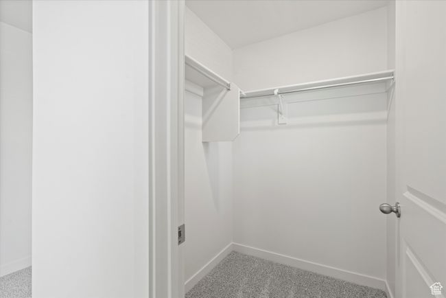 Spacious closet featuring carpet floors | Image 40
