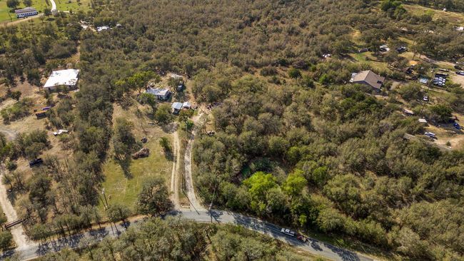 View of property location featuring a forest | Image 5