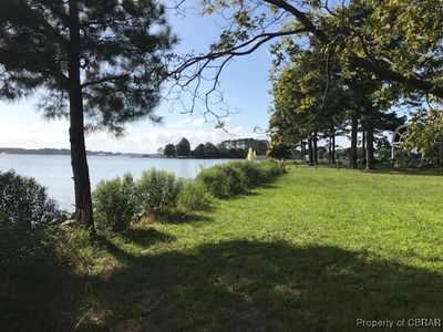 View of yard featuring a water view | Image 3