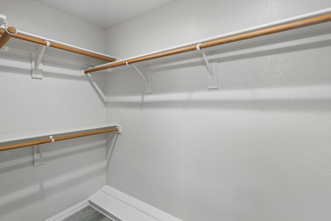 View of spacious closet | Image 26