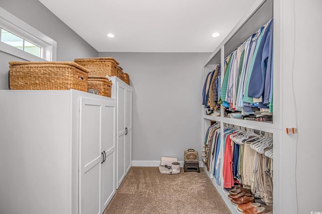 Spacious closet with carpet | Image 22