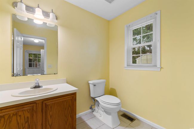 Bathroom featuring vanity and tile patterned flooring | Image 20