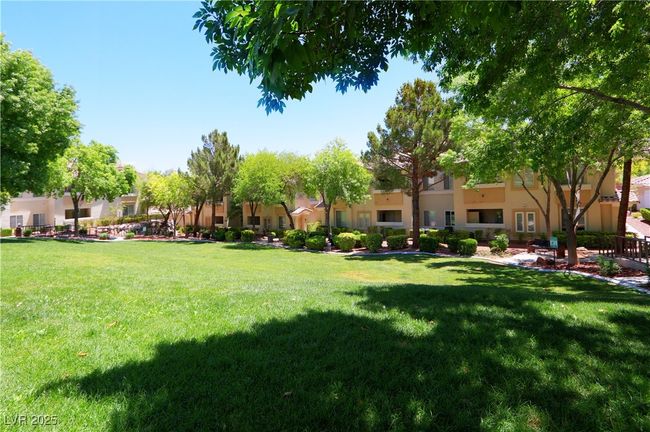 View of home's community featuring a lawn and a residential view | Image 22