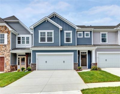 You'll love the Craftsman-style exterior of this home! HOME IS UNDER CONSTRUCTION. Photo is from builder's library and shown as an example only (colors, features and options will vary). | Image 1