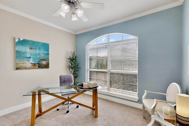 Carpeted office featuring ornamental molding and a ceiling fan | Image 28