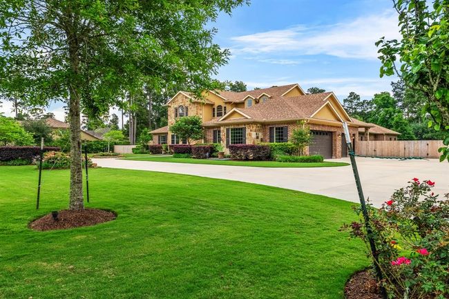 28002 Whispering Maple Way, House other with 5 bedrooms, 5 bathrooms and 3 parking in Spring TX | Image 11