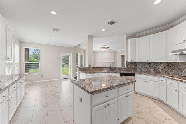 Nice kitchen open layout concept creates a seamless and modern living environment, that covers all kitchen needs. | Image 11