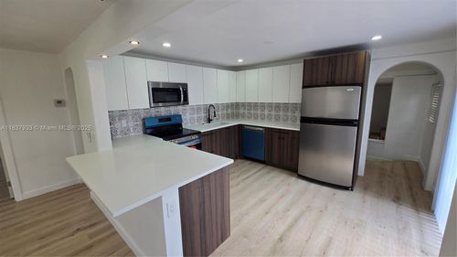 1448 Ne 24th Ct, Wilton Manors, FL, 33305-1318 | Card Image
