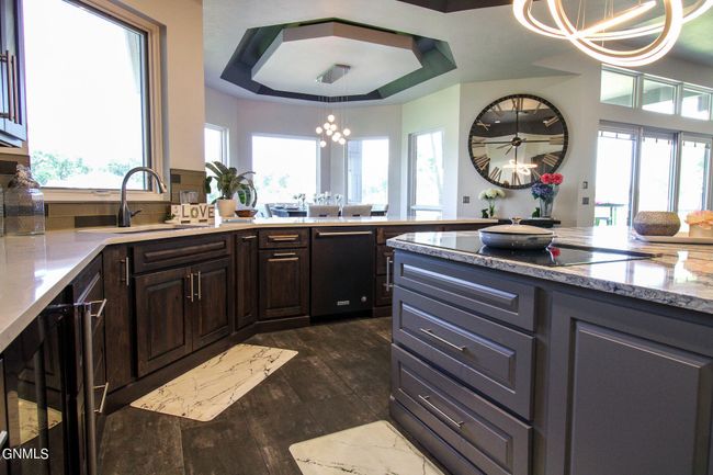 Cooktop in Island, Beverage refrigerator Under Counter | Image 20