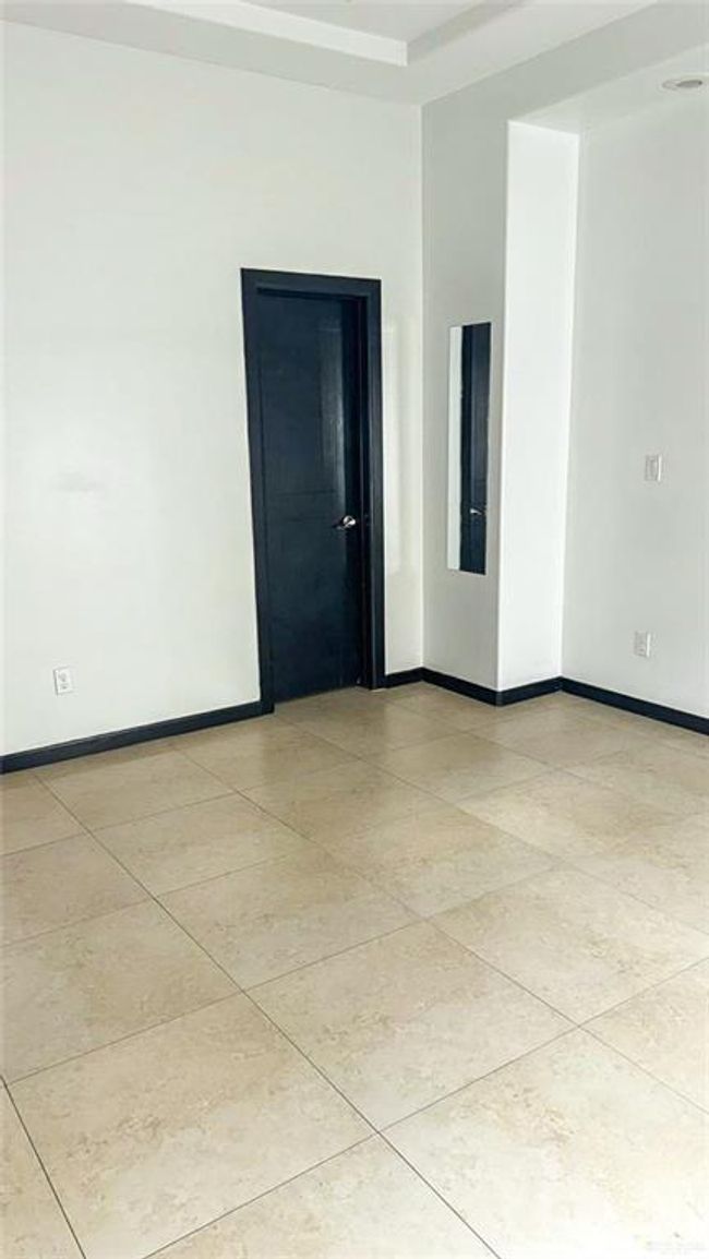 Spacious third bedroom to accommodate guest or use as an office. | Image 13