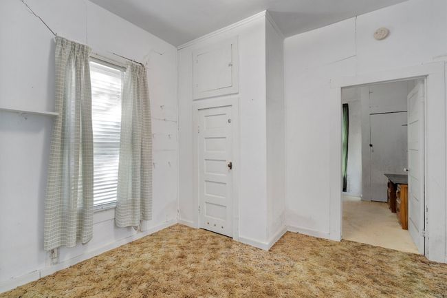 View of unfurnished bedroom | Image 12