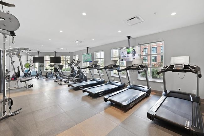 Workout area featuring baseboards and recessed lighting | Image 33
