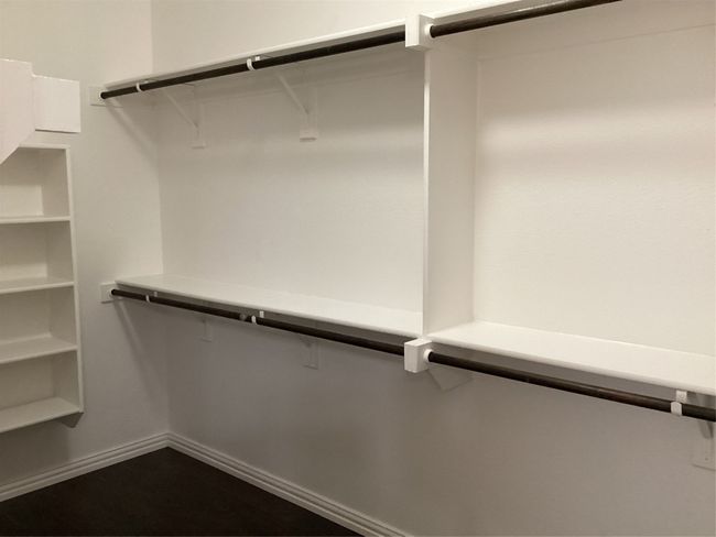 View of walk in closet | Image 17