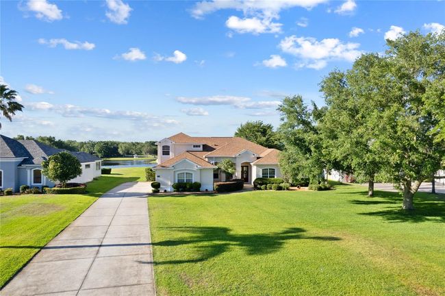 7351 Spring Mountain Ln, House other with 5 bedrooms, 4 bathrooms and null parking in YALAHA FL | Image 77