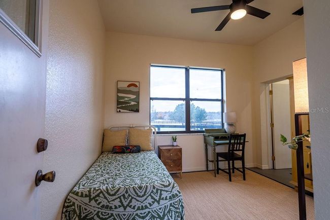 On the back side of the barn is the cozy newly remodeled apartment with full bath, kitchen, sitting and laundry area. | Image 58