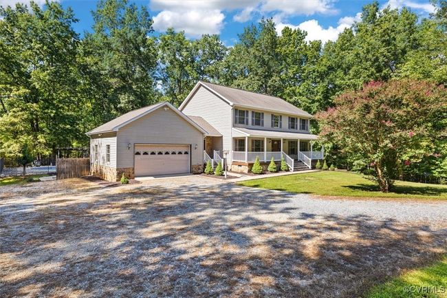 View of front of house featuring a porch and a front lawn | Image 17