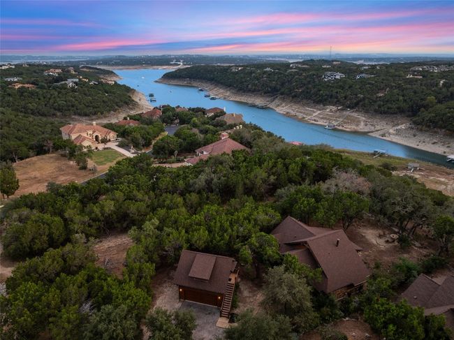 Another twilight aerial view, focusing on Devils Cove and Lake Travis in the distance. | Image 36