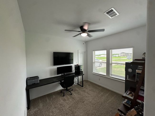Living room with a raised ceiling, ceiling fan, light wood-style flooring, and recessed lighting | Image 8