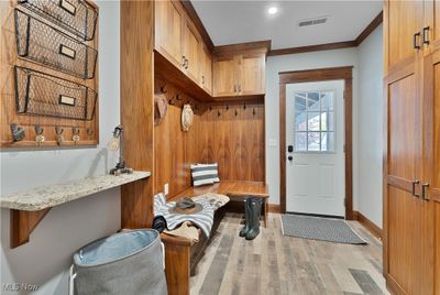 Mudroom with ornamental molding and light wood-type flooring | Image 3