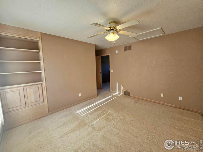 Bedroom with built-in book shelf/storage | Image 31