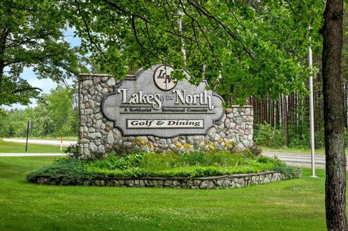 8056 Fairway Hallow Dr. Drive, Mancelona Village, MI, 49659 | Card Image