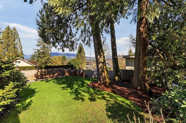 View of yard featuring a fenced backyard | Image 29