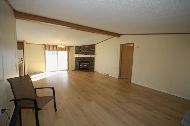 Contemporary-Style Open Floor Plan w/ Cathedral Ceiling allowing even more open space living | Image 26