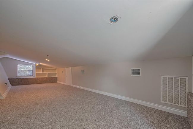 Oversized game room with plenty of room for storage also. | Image 27