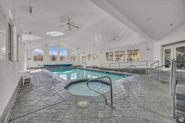 View of pool with ceiling fan, french doors, and a covered pool | Image 47