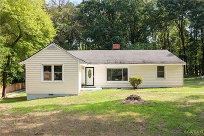 763 Oak Spring Lane is positioned in a premiere location in the heart of Manakin Sabot, Goochland County. With 1, 847 sqft, 3 bedrooms, this simple ranch home sits quietly down a gravel road. | Image 1