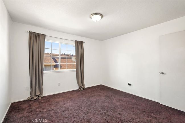 Upstairs: Bedroom 2 with wall-to-wall closet | Image 12