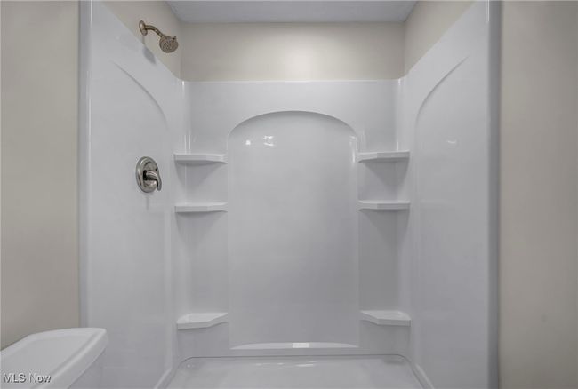 Bathroom with a shower stall | Image 21