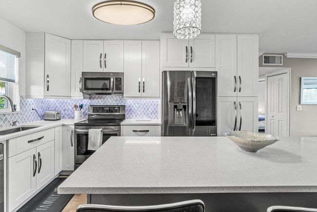 APT-103 - 311 E Ocean Ave, Condo with 2 bedrooms, 2 bathrooms and null parking in Lantana FL | Image 7