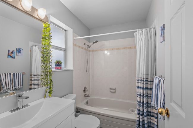 Full bath with vanity and shower / bath combination with curtain | Image 11