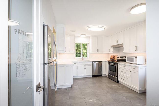 Kitchen was a $40000 renovation with quartz counters | Image 6
