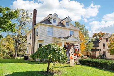 View of front of house featuring central air condition unit and a front yard | Image 3