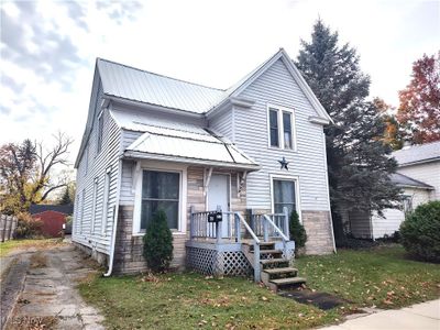 View of front of home with a front yard | Image 1