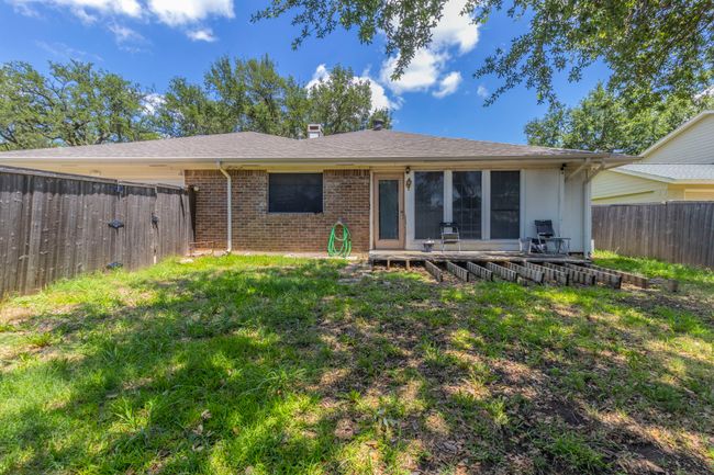 Rear view of house featuring brick siding | Image 23